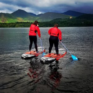 hen party enjoying a tranquil paddle on Derwent Water