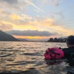 A girl wild swimming in Keswick